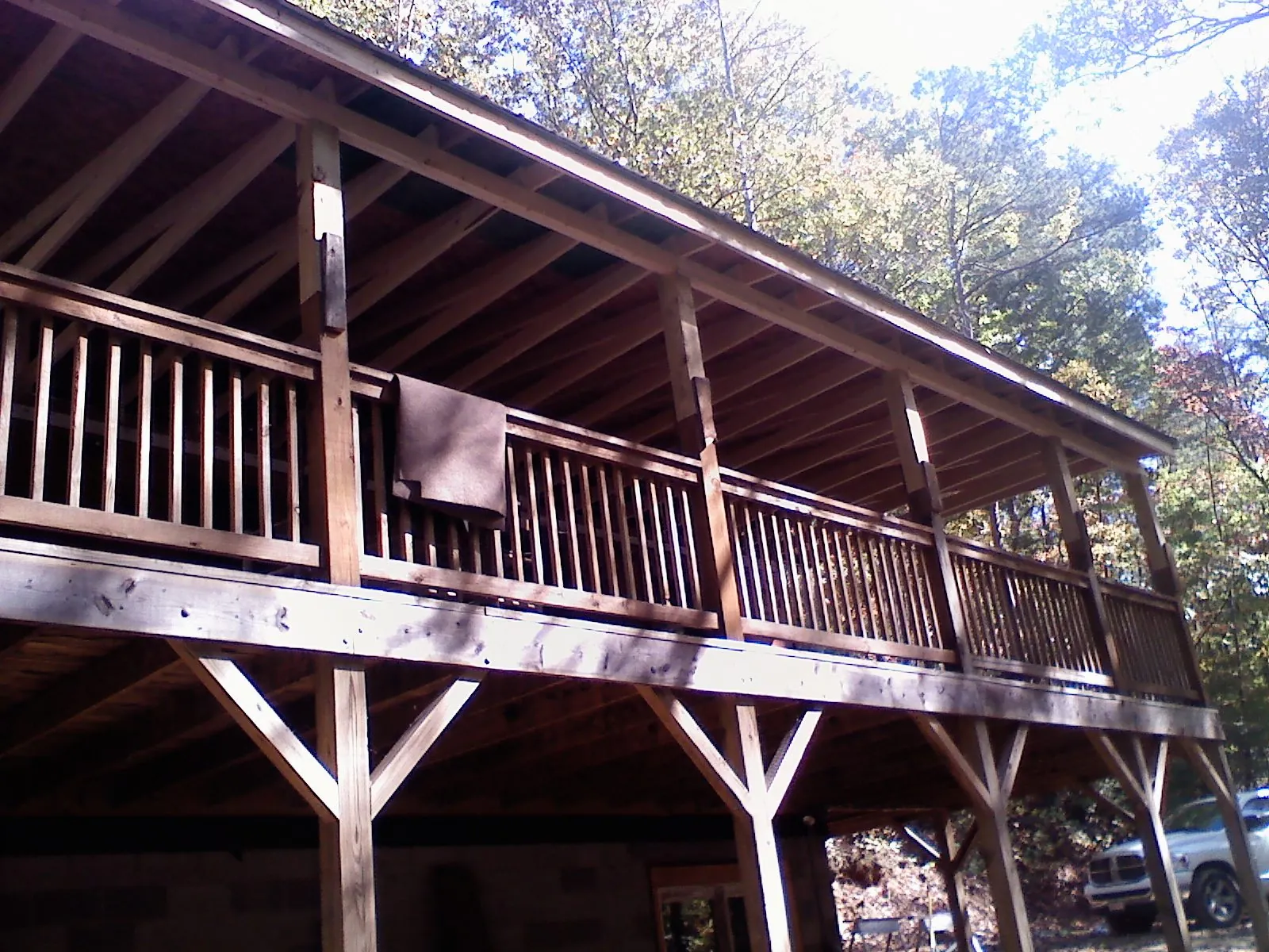Timber framing under a new elevated porch and deck — Roof Leak Repair in Jamesville by Roofing Brothers